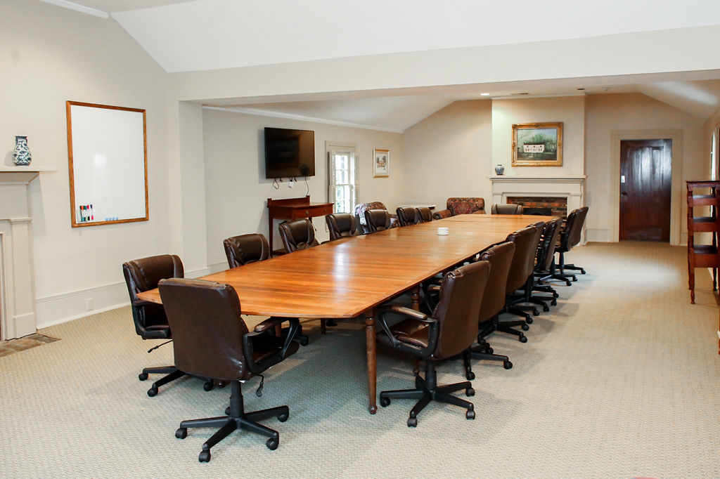 photo of table and chairs in corporate conference room