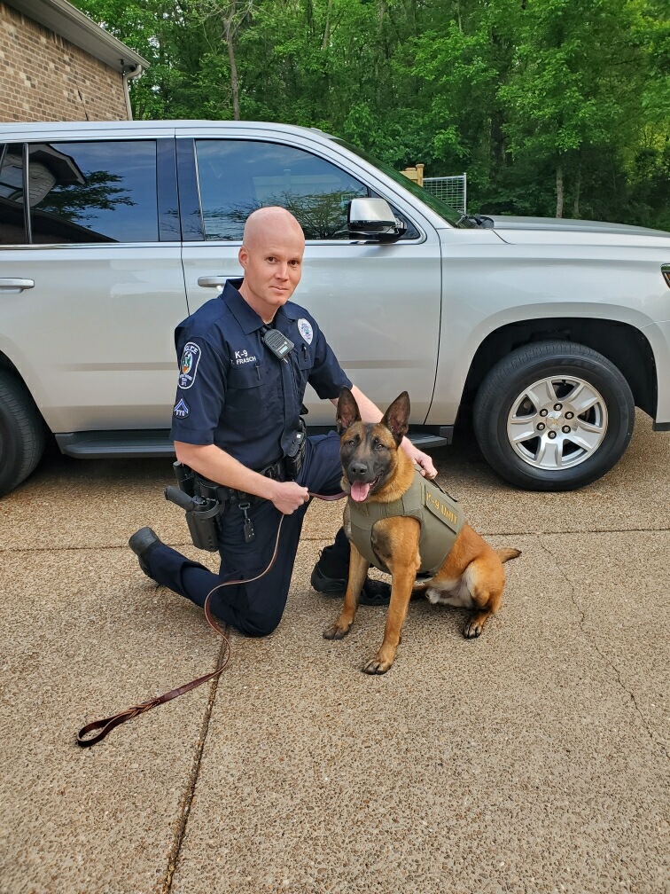 DET Officer Trey Frasch and K9 Officer Pax