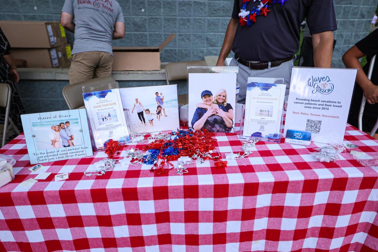 Waves of Grace Sponsor Table at the 2024 July 4 Concert